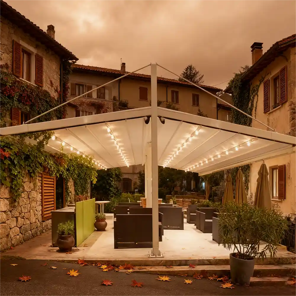 Lumisong commercial freestanding awning system installed at a luxury restaurant terrace, featuring an independent double-sided retractable structure, motorized control, and waterproof weather-resistant fabric shelter.